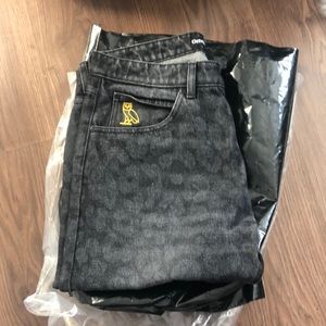 OVO leopard print denim pants.
